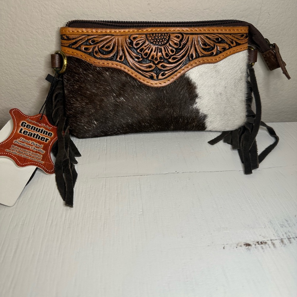 Hand carving by the finest leather craftsman. American Darling.